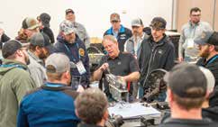 Technicians in a hands-on training session for Certification Program