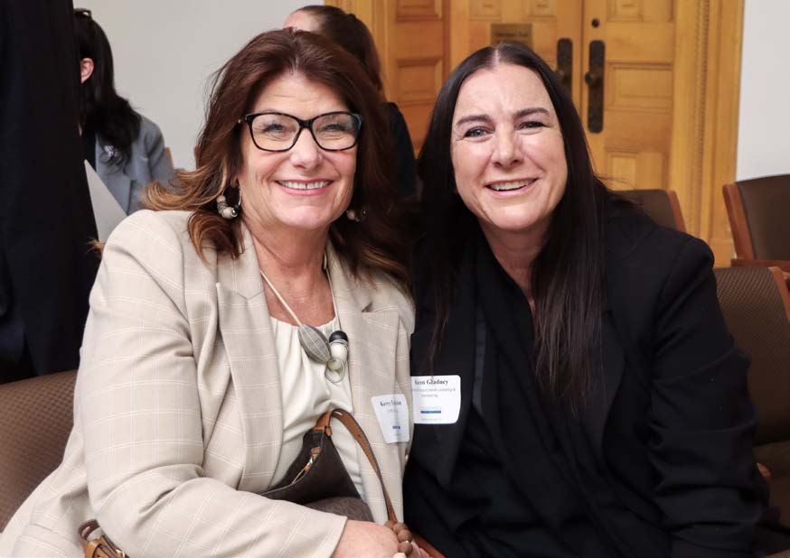 Kerry Egelston and Karen Gladney posing for a photo together.