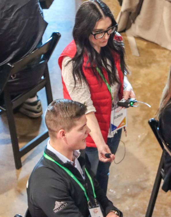 Close-up of event attendees sharing ideas