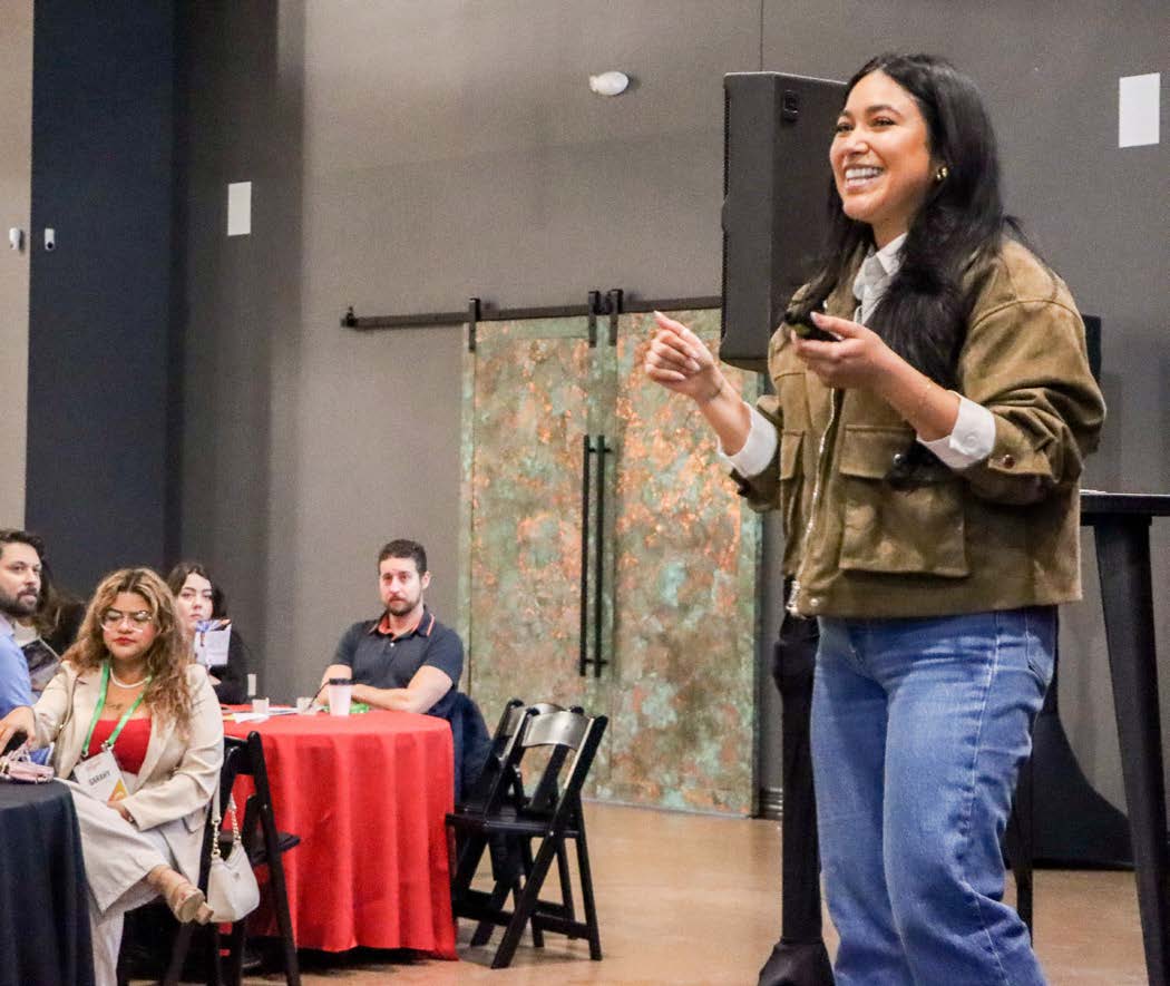 Faith Mendoza presenting to the audience