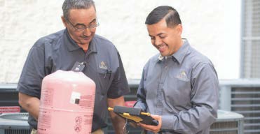 Maintenance technicians collaborating