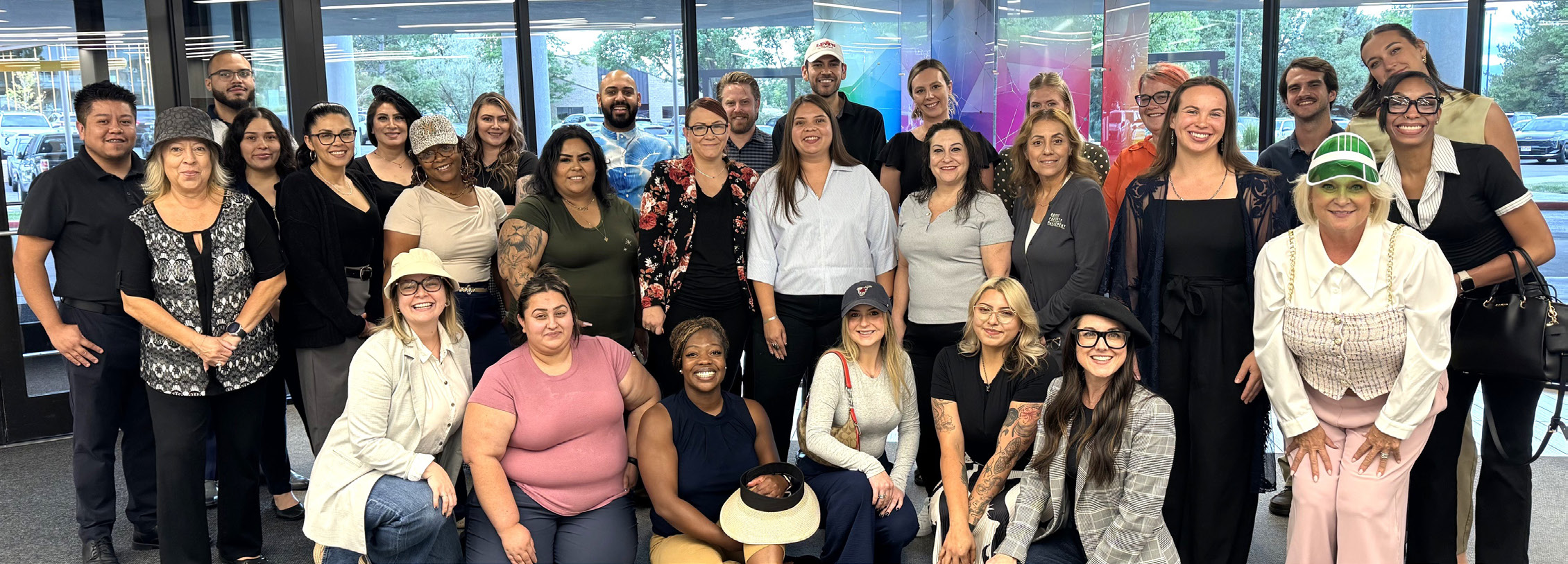 Assistant Managers and class participants gathered for a group photo