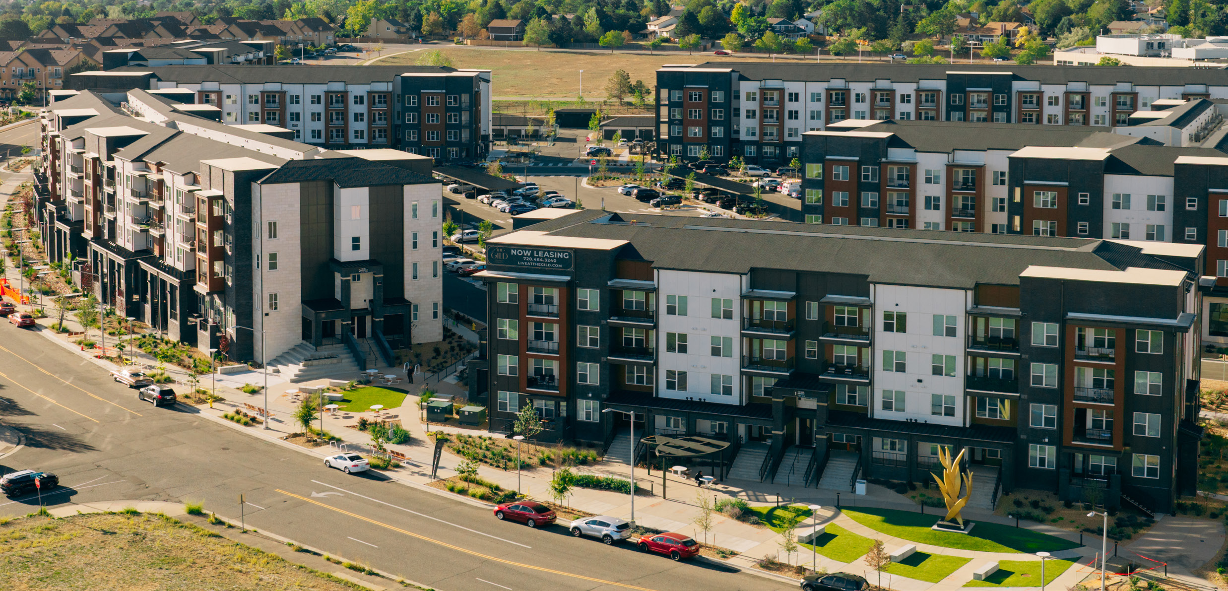Aerial view of The Gild apartment community and surrounding neighborhood