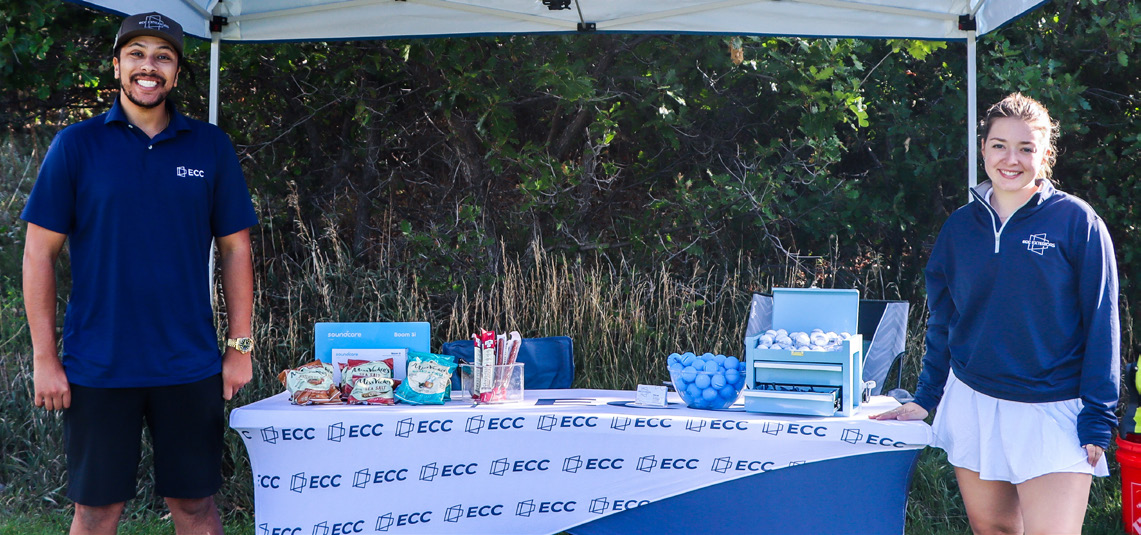 ECC Exteriors representatives at their event table