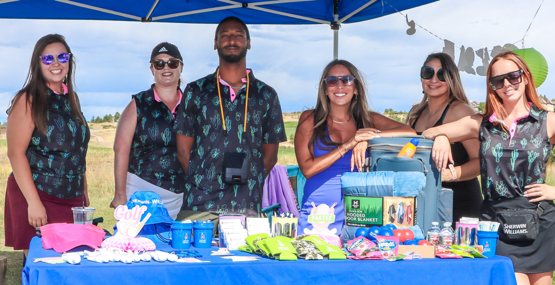 Sherwin-Williams representatives at their event table